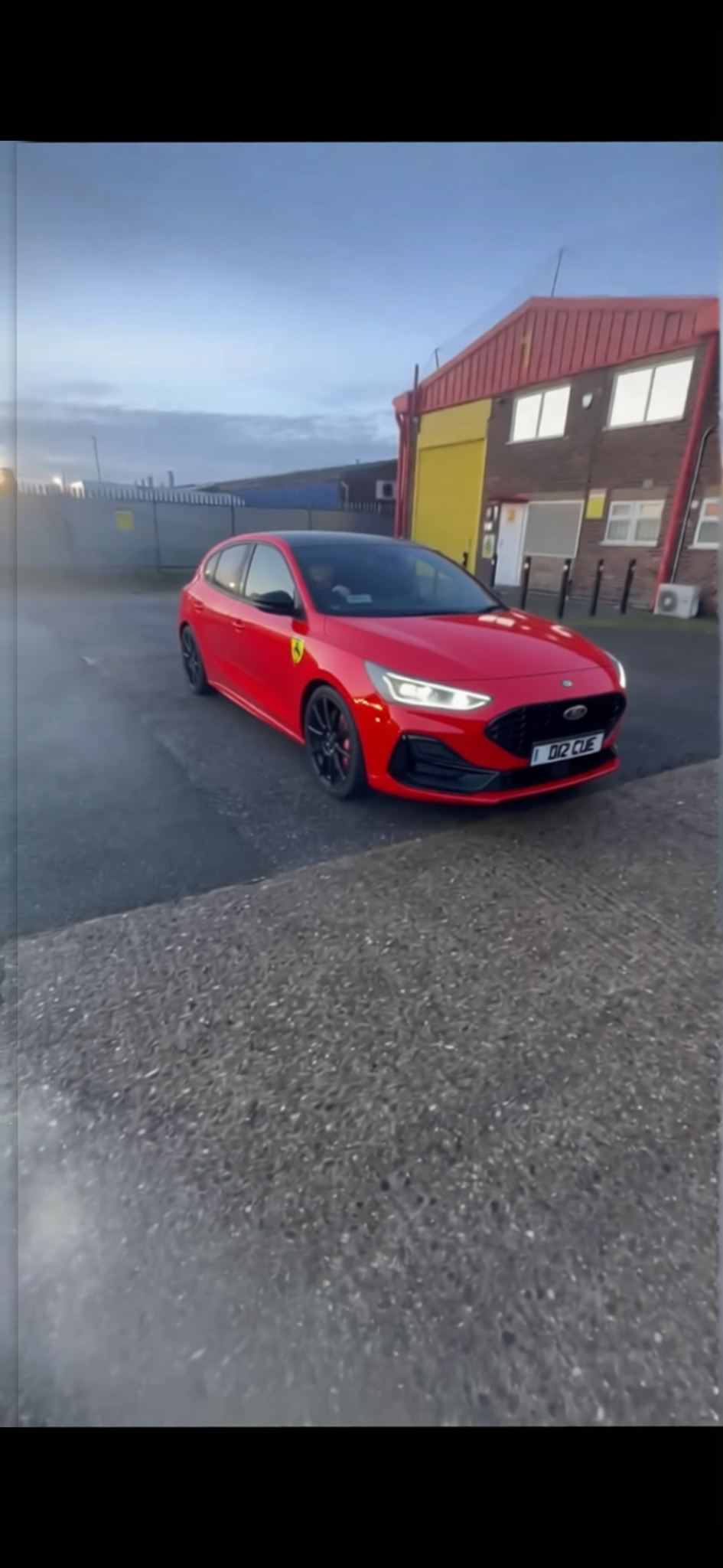 Ford Focus rendered in Ferrari Red gloss paint